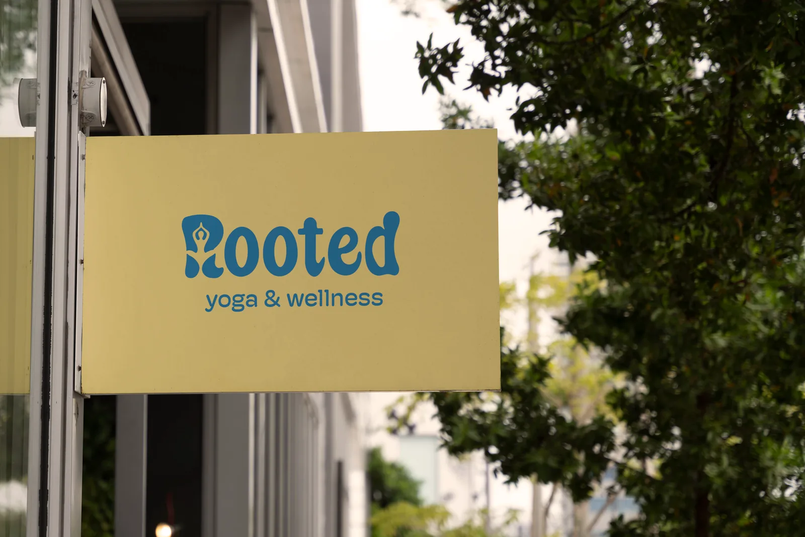 Rooted blade sign on a storefront